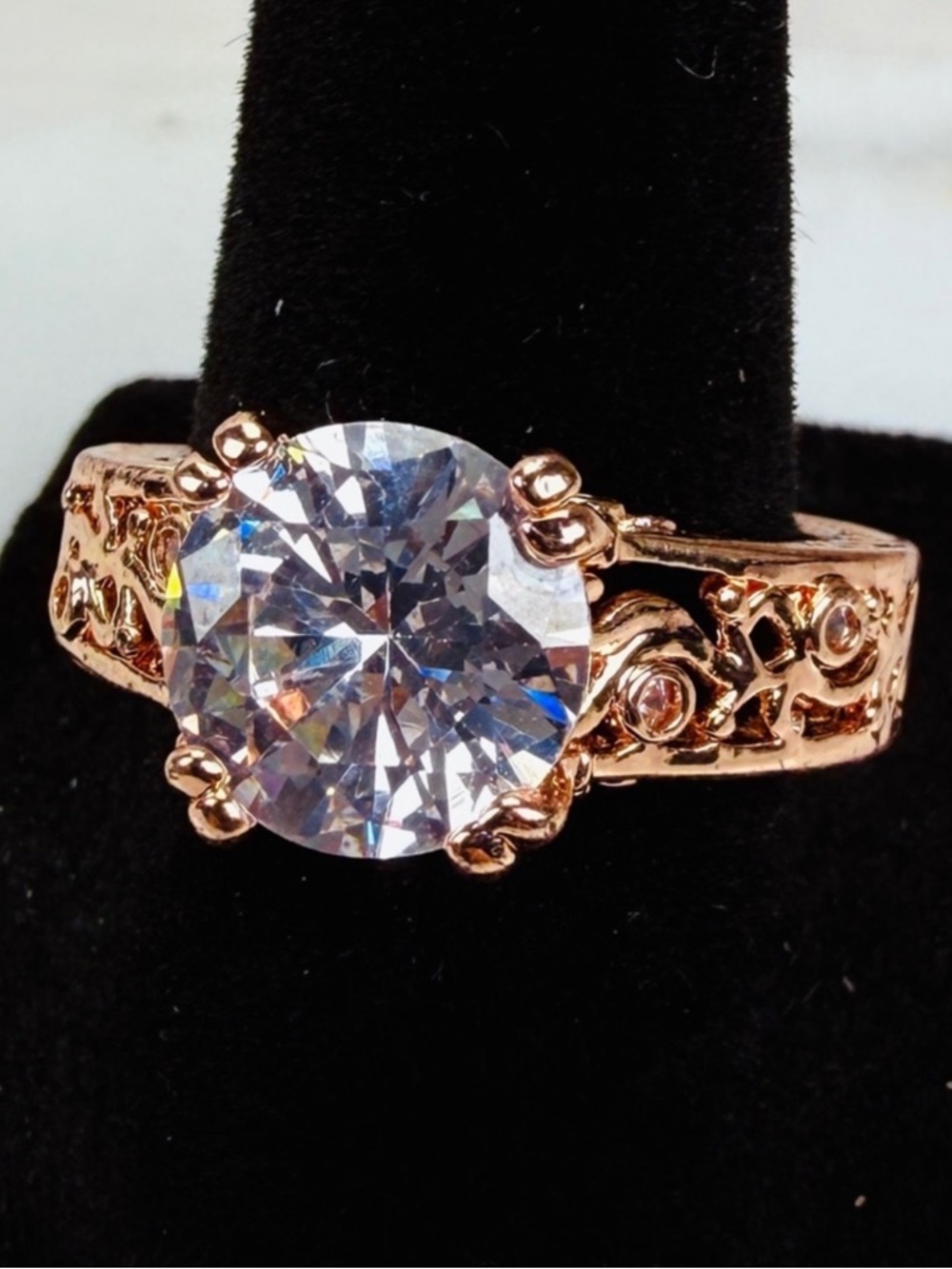 Beautiful rose goldtone, clear bling size 8 costume ring